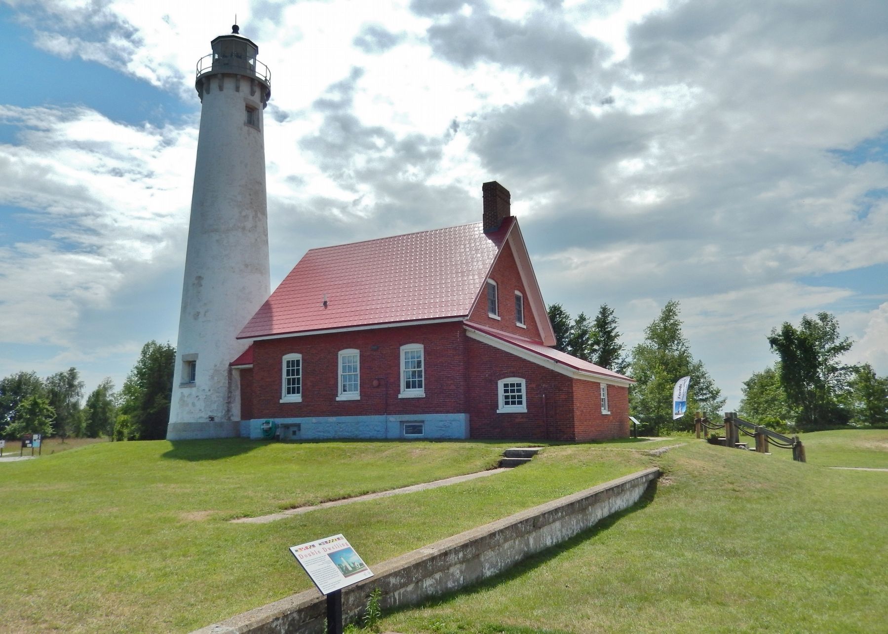 Double Dwelling Marker (<i>wide view; Tawas Point Light Station in background</i>) image. Click for full size.