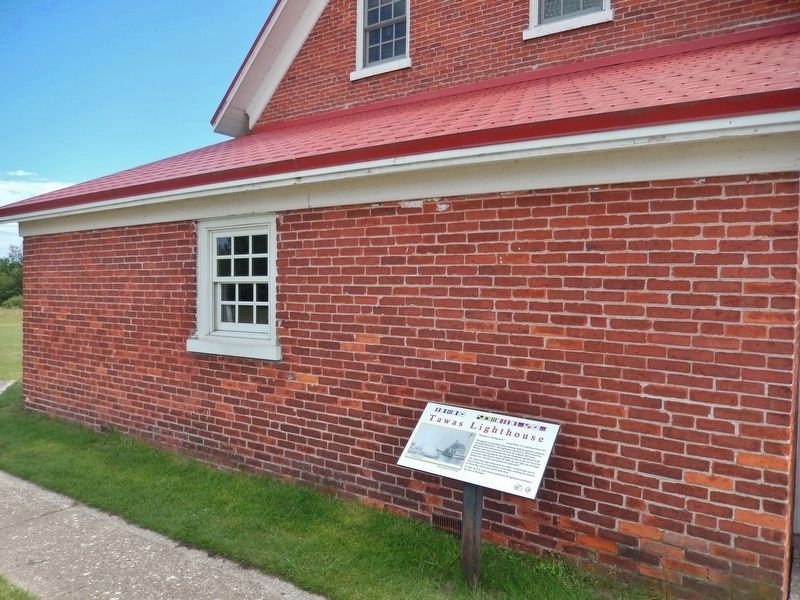 Tawas Lighthouse Marker (<i>wide view; Tawas Lighthouse north side in background</i>). Click for full size. Tawas Lighthouse Marker (<i>wide view; Tawas Lighthouse north side in background</i>) image. Click for full size.