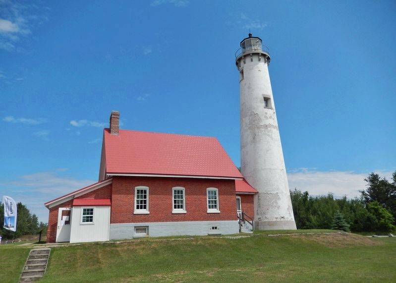 Tawas Lighthouse (<i>west side; note: dry, grassy lawn where lake approached foundation in 1880</i>) image. Click for full size.