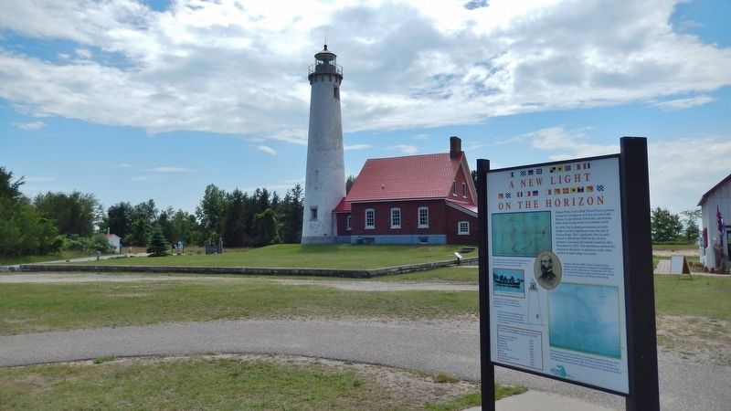 A New Light on the Horizon Marker (<i>wide view; Tawas Lighthouse in background</i>) image. Click for full size.