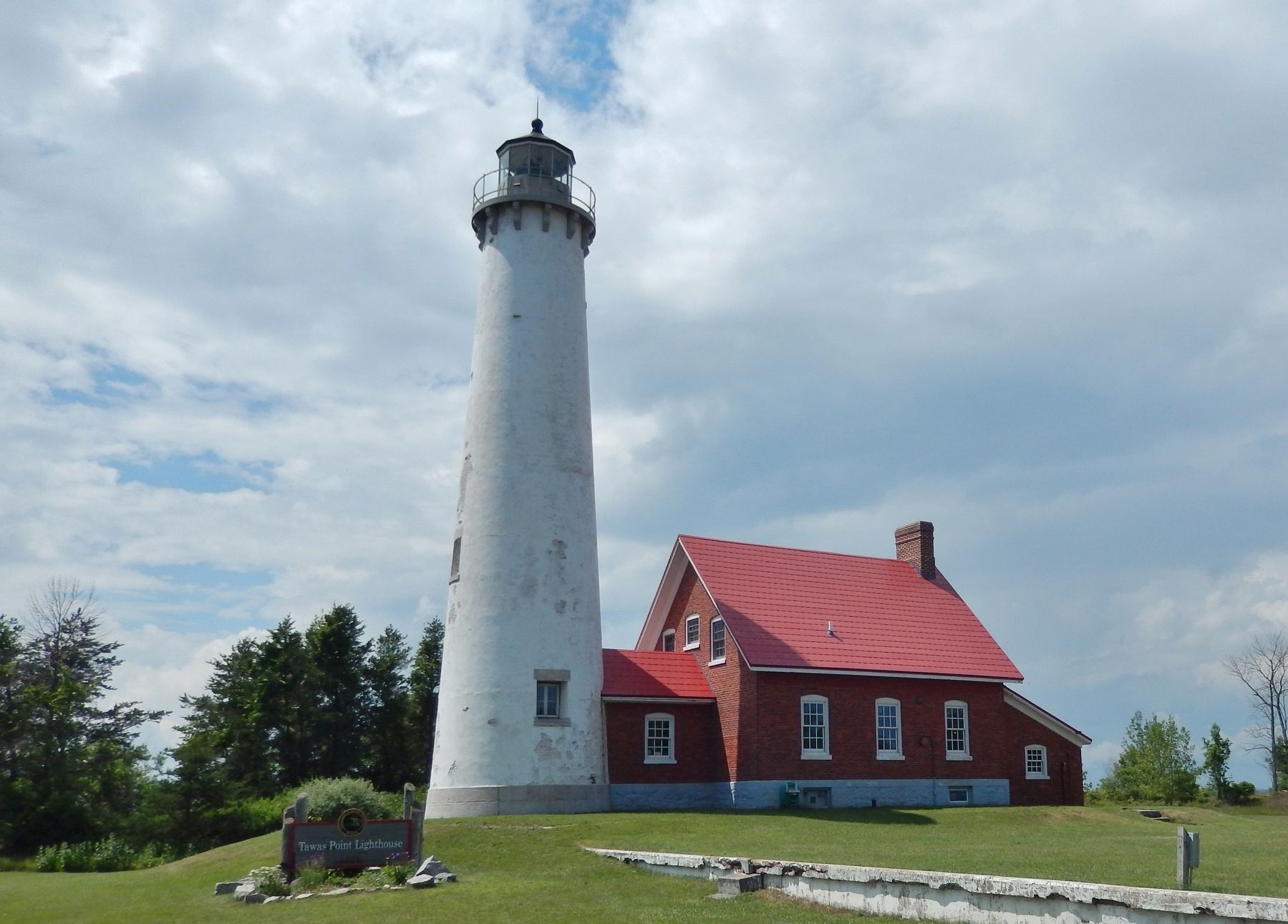 Tawas Point Lighthouse (<i>view from near marker</i>). Click for full size. Tawas Point Lighthouse (<i>view from near marker</i>) image. Click for full size.