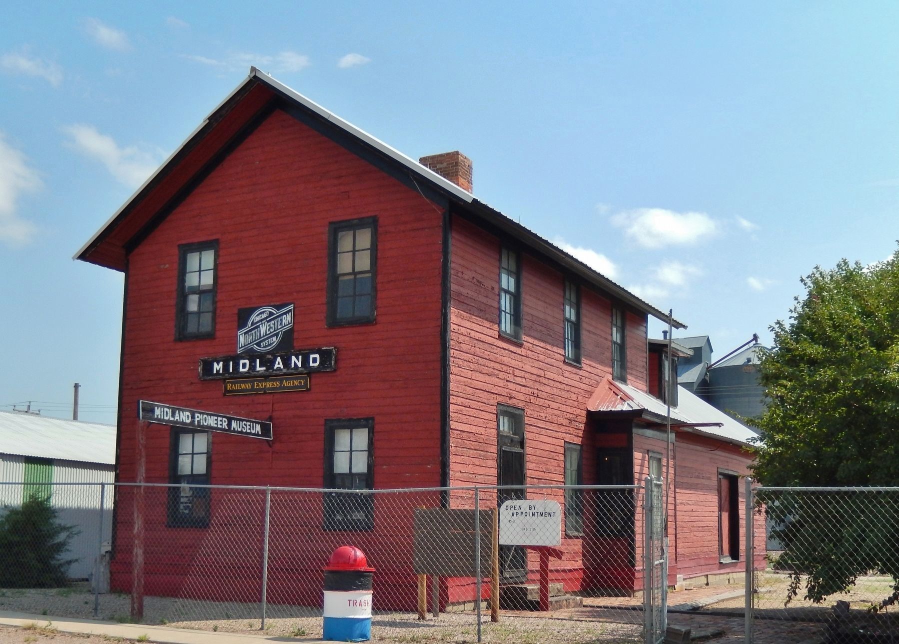 Midland Pioneer Museum / 1906 Chicago & North Western Railroad Depot (<i>marker behind fence</i>). Click for full size. Midland Pioneer Museum / 1906 Chicago & North Western Railroad Depot (<i>marker behind fence</i>) image. Click for full size.