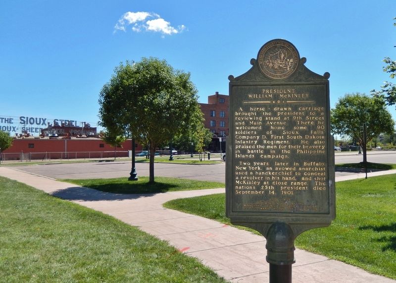 President William McKinley Marker (<i>wide view looking east across parking lot</i>). Click for full size. President William McKinley Marker (<i>wide view looking east across parking lot</i>) image. Click for full size.