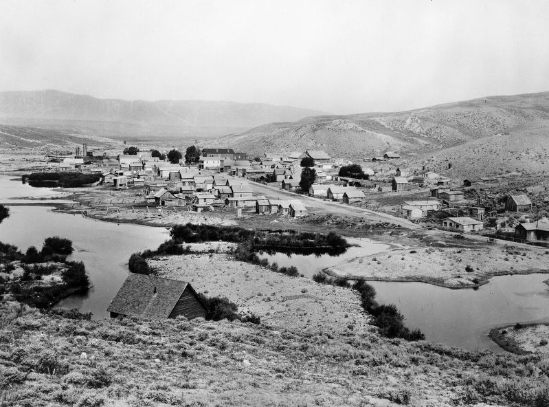 Bannack circa 1900; the dredge is locate toward the upper left. image. Click for full size.