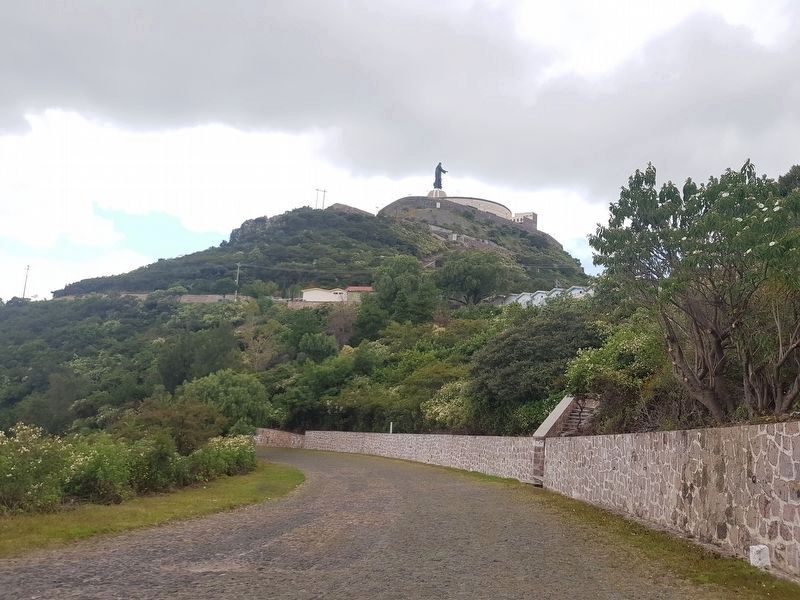 A view of the Cerro de Cubilete and Christ the King statue on the road up to the site image. Click for full size.