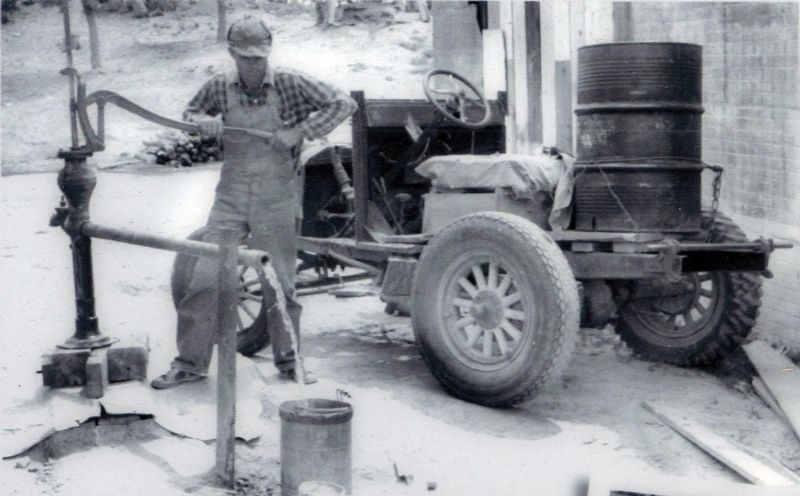 Farmer Pumping water at a community Well in Pie Town New Mexico, circa 1940.. Click for full size. Farmer Pumping water at a community Well in Pie Town New Mexico, circa 1940. image. Click for full size.