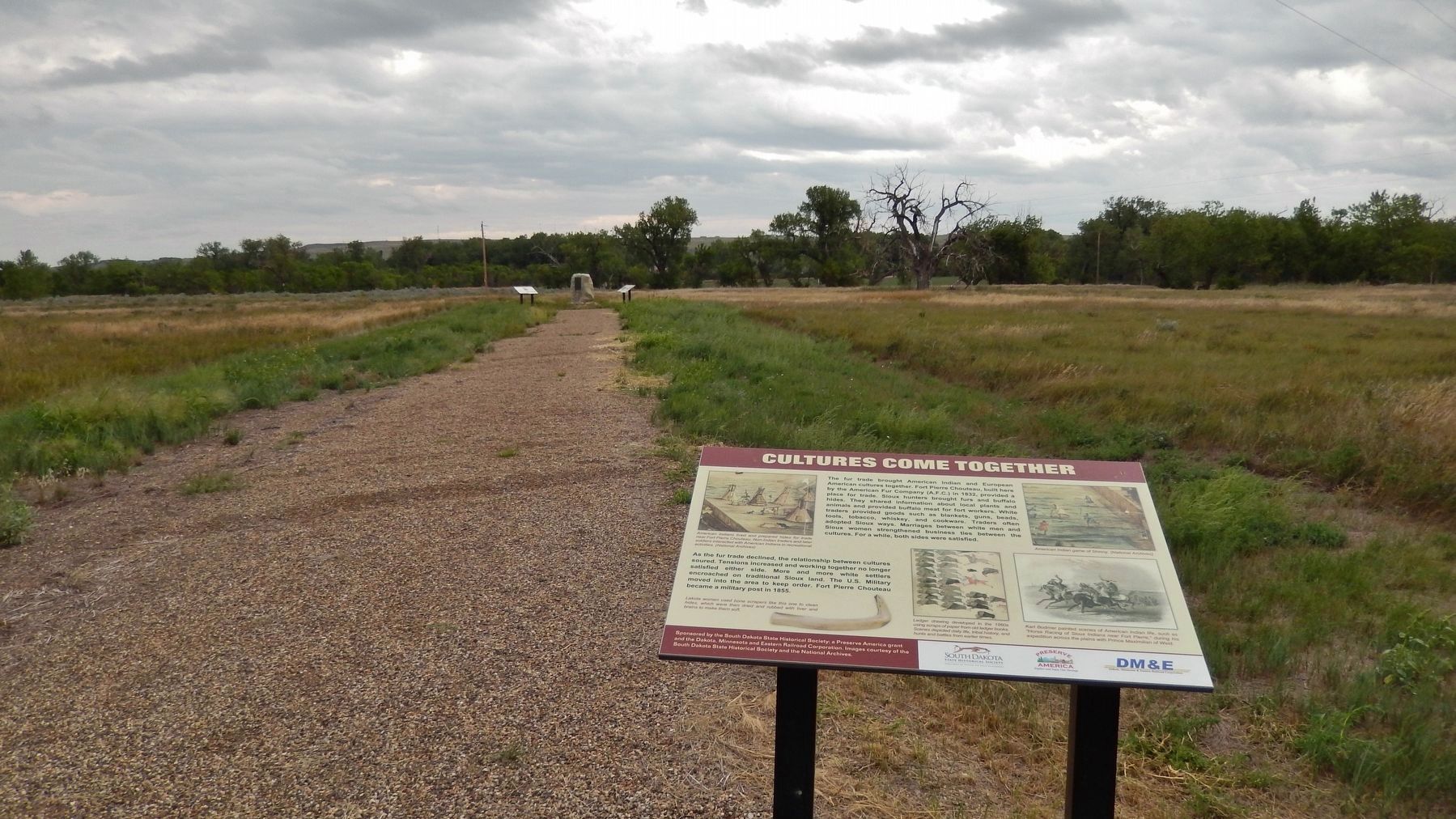 Cultures Come Together Marker (<i>wide view; Fort Pierre Chouteau Site in background</i>) image. Click for full size.