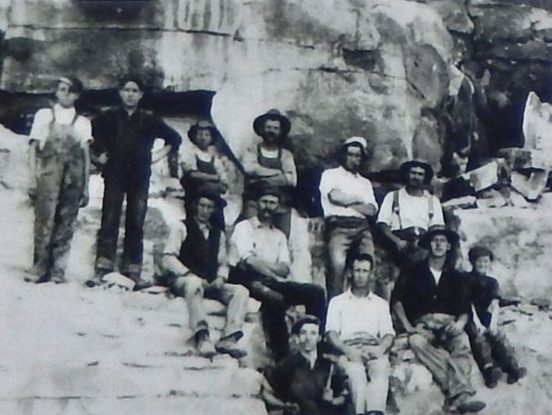 Marker detail: Workers pose in front of a quartzite wall at the East Sioux Falls quarries, ca. 1910 image. Click for full size.