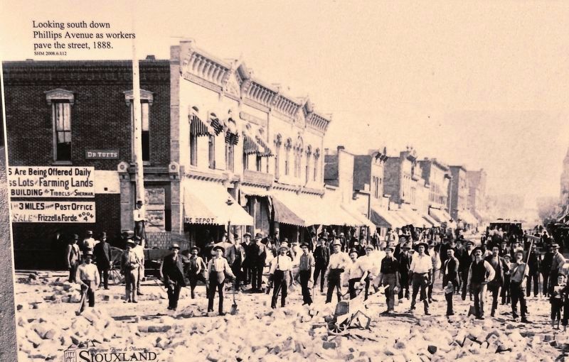 Marker detail: Looking south down Phillips Avenue as workers pave the street, 1888 image. Click for full size.