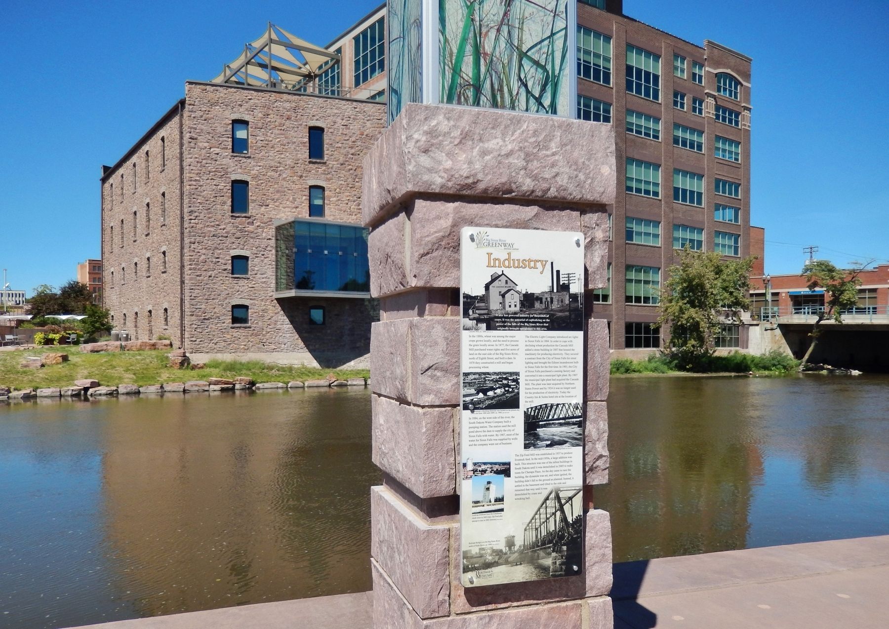 Industry Marker (<i>wide view; Big Sioux River and Raven Industries building in background</i>) image. Click for full size.