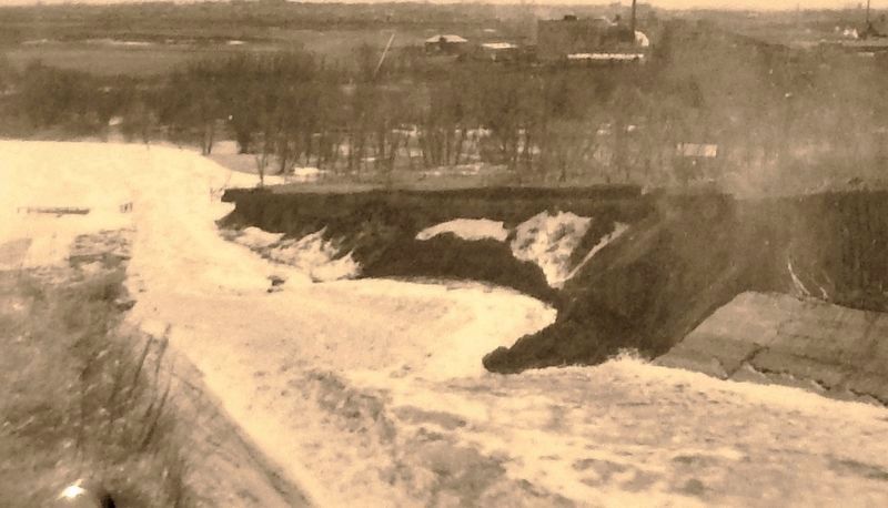 Marker detail: Lower end of the spillway collapsing from the pressure of the flood waters, 1915 image. Click for full size.