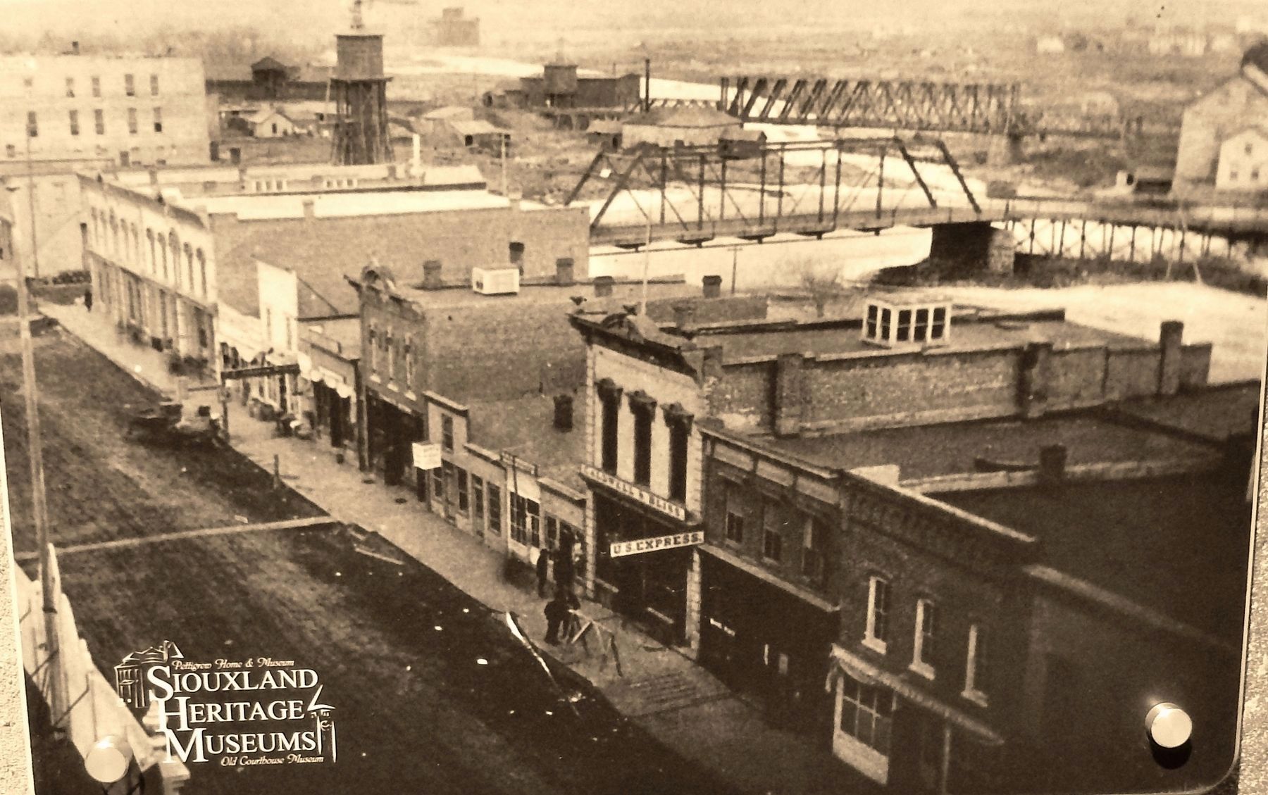 Marker detail: View of Phillips Avenue at Eighth Street bridge over the Big Sioux River, ca. 1880s. Click for full size. Marker detail: View of Phillips Avenue at Eighth Street bridge over the Big Sioux River, ca. 1880s image. Click for full size.