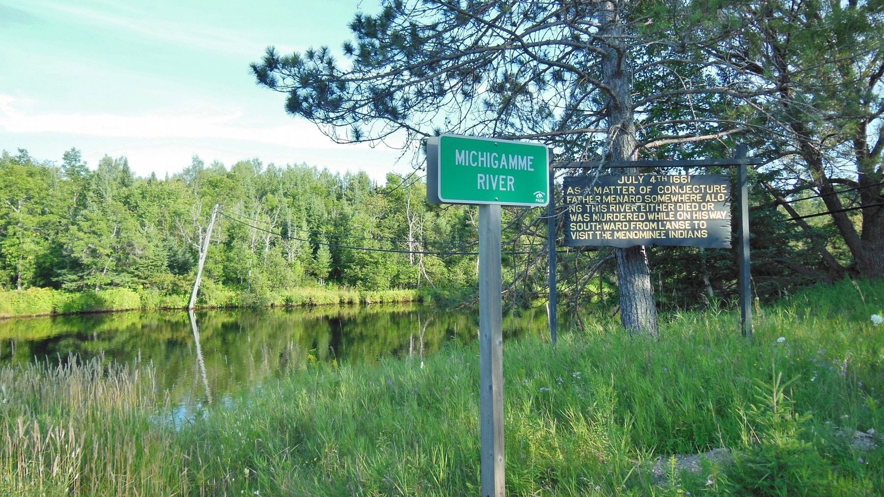 July 4th 1661 Marker (<i>wide view from highway; Michigamme River in background</i>) image. Click for full size.