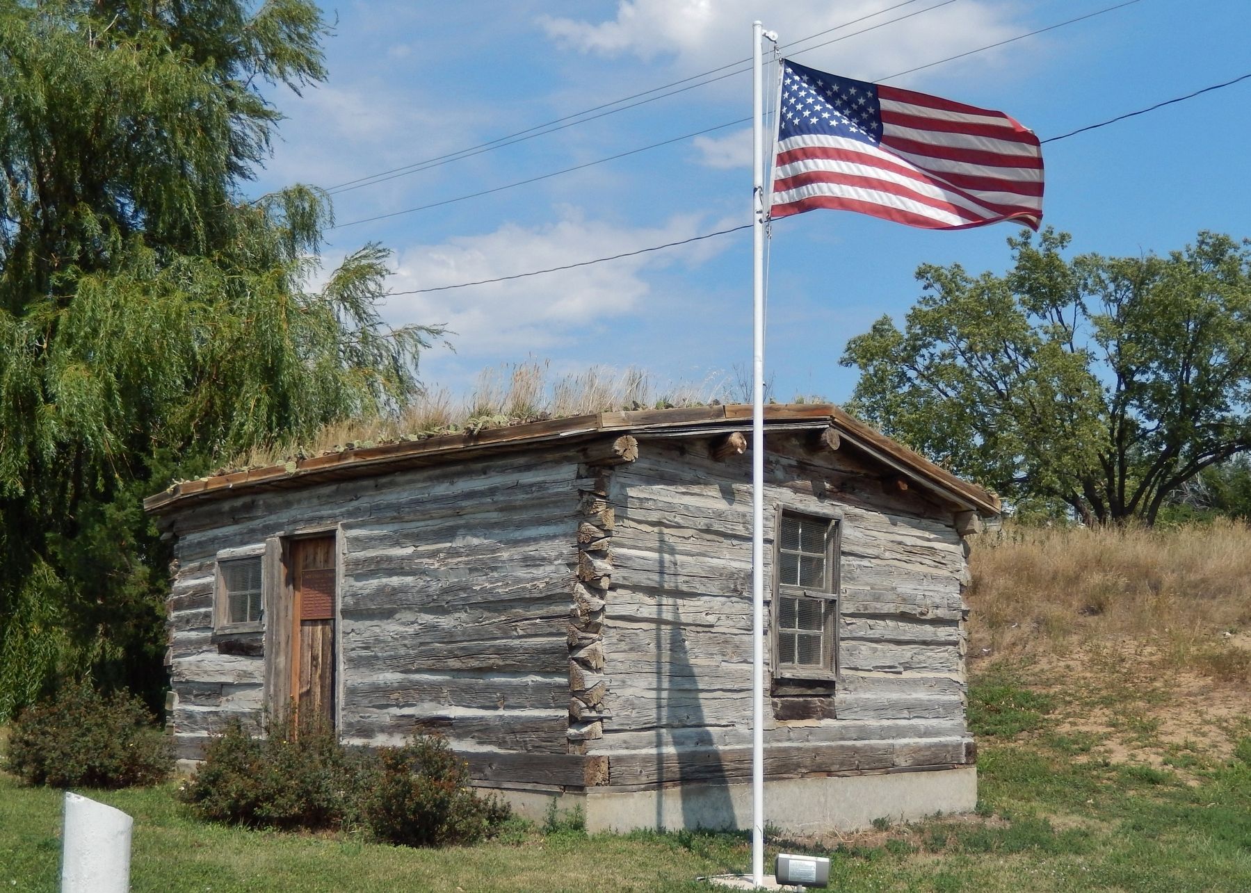 Molyneux Cabin (<i>southeast corner view from Larimer Avenue</i>). Click for full size. Molyneux Cabin (<i>southeast corner view from Larimer Avenue</i>) image. Click for full size.