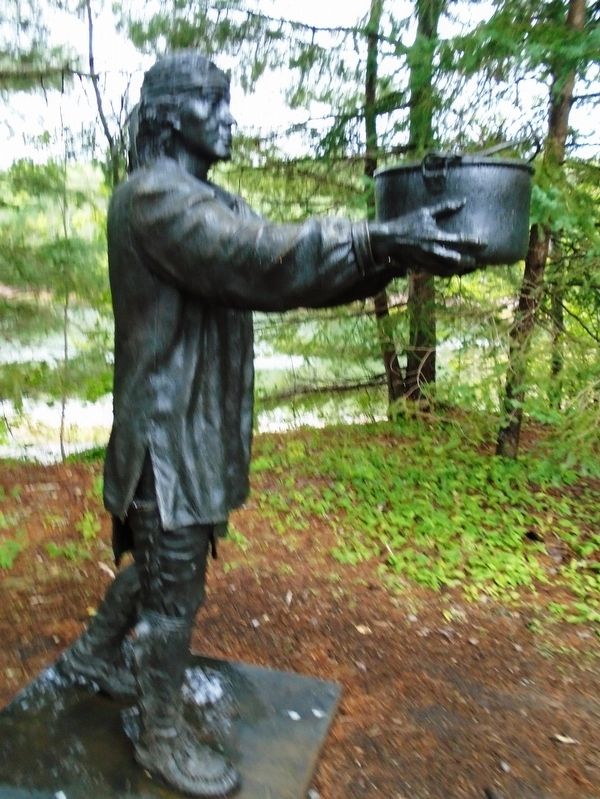 Statue Complimenting Exploring the Coast / Exploration de la côte Marker. Click for full size. Statue Complimenting Exploring the Coast / Exploration de la côte Marker image. Click for full size.