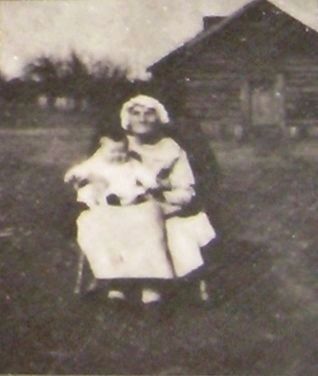 Marker photograph: ”Aunt” Orelena Puckett with Maxwell Dale Hawks, the last child she delivered image. Click for full size.