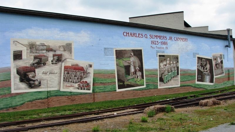 Charles G. Summers Jr. Cannery Mural (<i>located along rail trail, near marker</i>) image. Click for full size.
