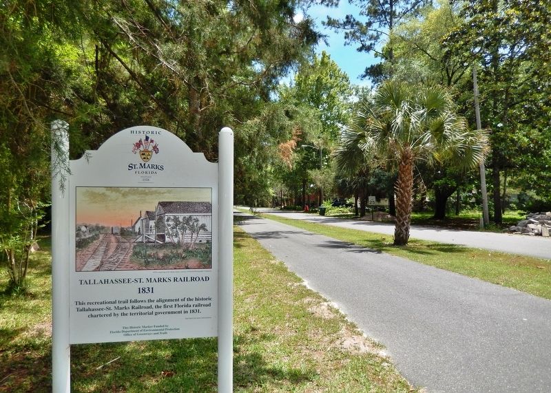 Tallahassee - St. Marks Railroad Marker (<i>side 1; wide view; looking south along rail trail</i>) image. Click for full size.