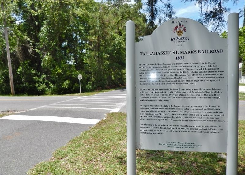 Tallahassee - St. Marks Railroad Marker (<i>side 2; wide view; looking north along Ladd Drive</i>) image. Click for full size.
