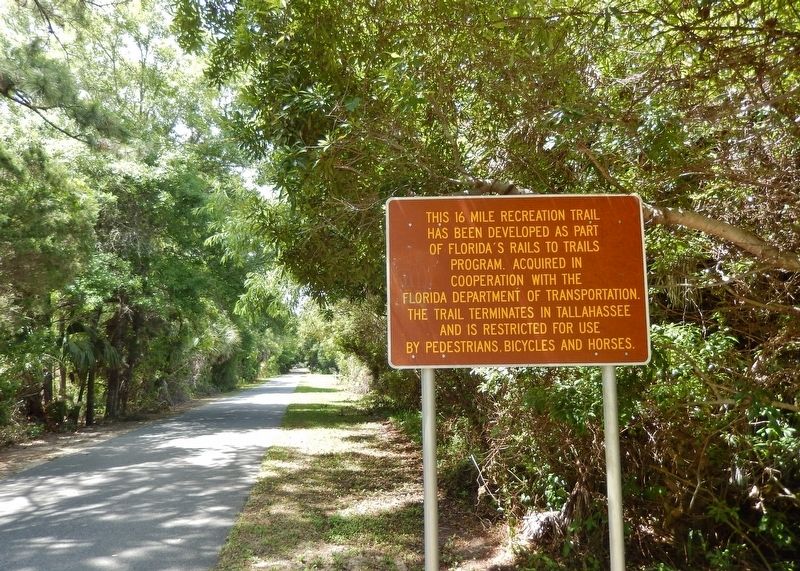 Tallahassee - St. Marks Railroad Historic Trail Sign (<i>on trail; south of marker</i>) image. Click for full size.