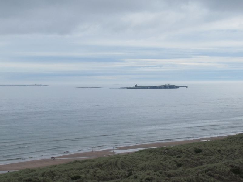 The Hazardous Farne Islands from Bamburgh Castle. Click for full size. The Hazardous Farne Islands from Bamburgh Castle image. Click for full size.