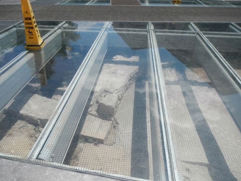 The archaeological excavation beneath glass panels image. Click for full size.