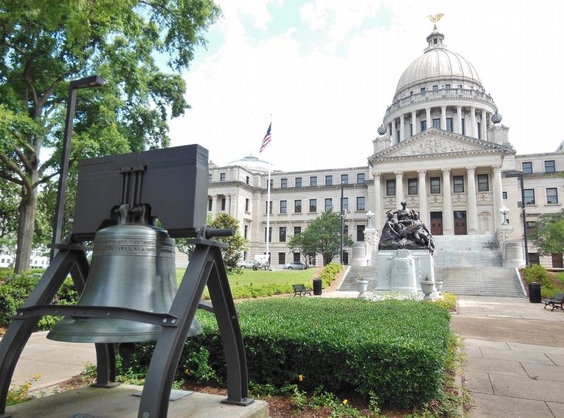 Mississippi Liberty Bell Replica (<i>Mississippi State Capitol in background</i>) image. Click for full size.
