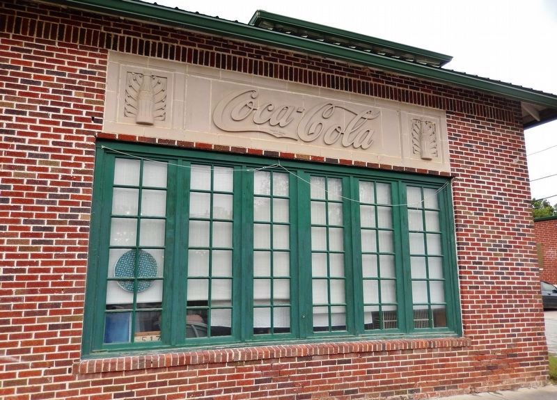 Coca Cola Bottling Plant (<i>east side view with tiled logo detail above windows</i>) image. Click for full size.