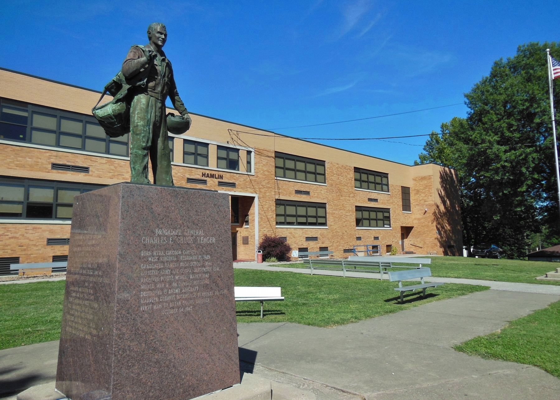 Brigadier General Charles E. "Chuck" Yeager Monument (<i>wide view; Hamlin Grade School behind</i>) image. Click for full size.