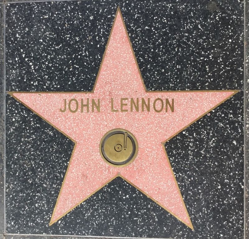 John Lennon's star in front of the building image. Click for full size.
