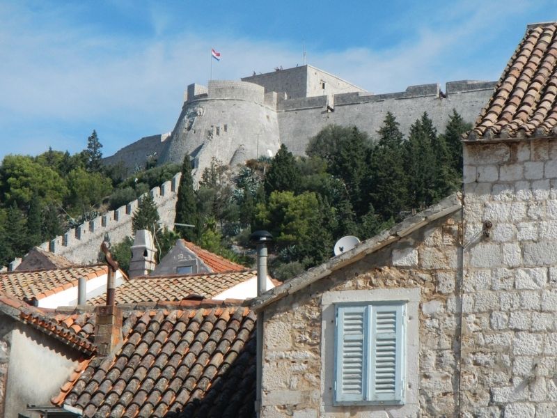A section of the city wall can be seen below the fortress bastion. image. Click for full size.