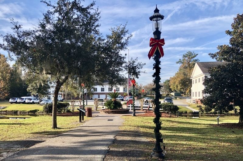 View of marker looking southwest towards Richmond Hill Police Department. image. Click for full size.