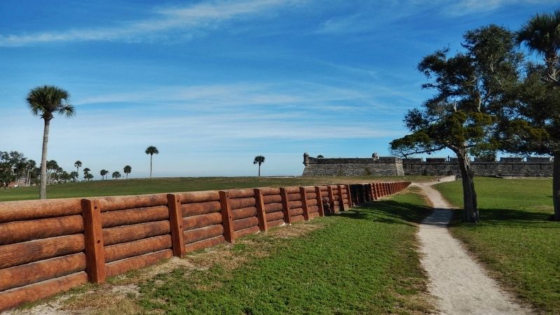 Cubo Line wall replica (<i>south side; view from near marker; Castillo San Marcos background</i>) image. Click for full size.