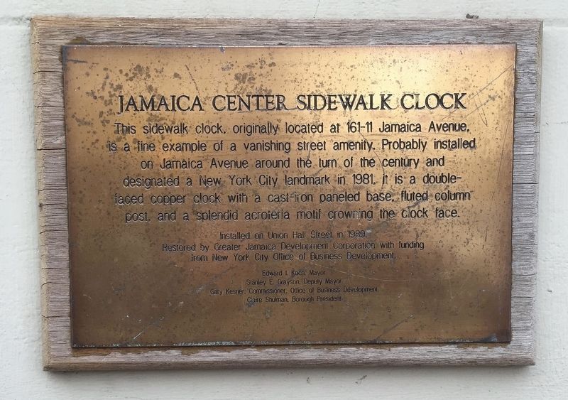 Jamaica Center Sidewalk Clock Marker image. Click for full size.
