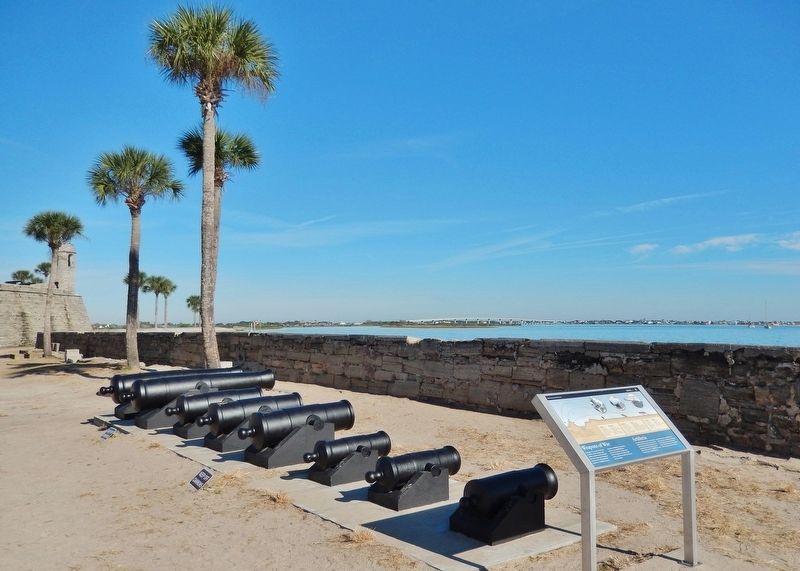 Weapons of War Marker (<i>wide view; cannons on exhibit in front of marker; Matanzas Bay right</i>) image. Click for full size.