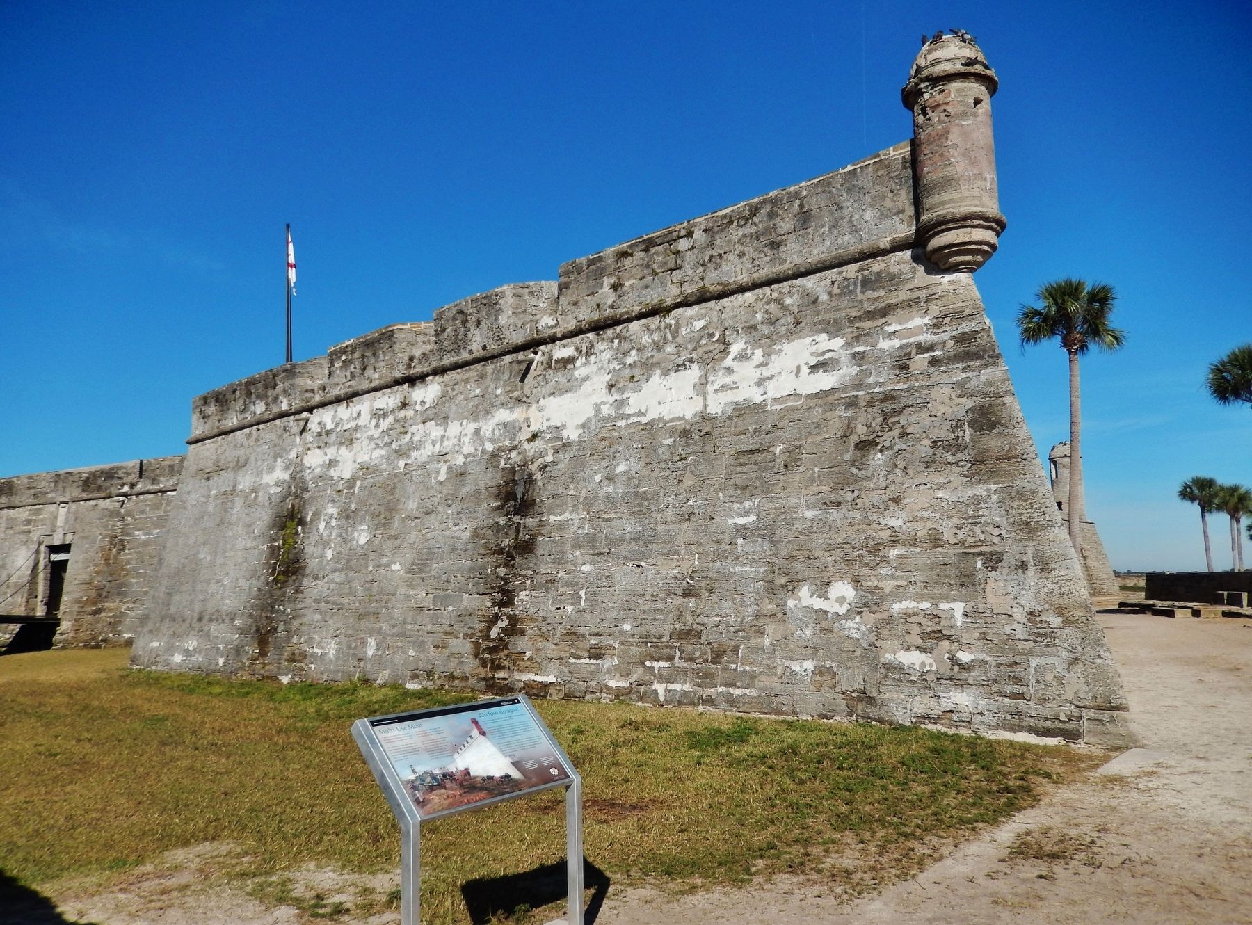 Multi-Use Moat Marker (<i>wide view; moat and San Agustin Bastion in background</i>) image. Click for full size.