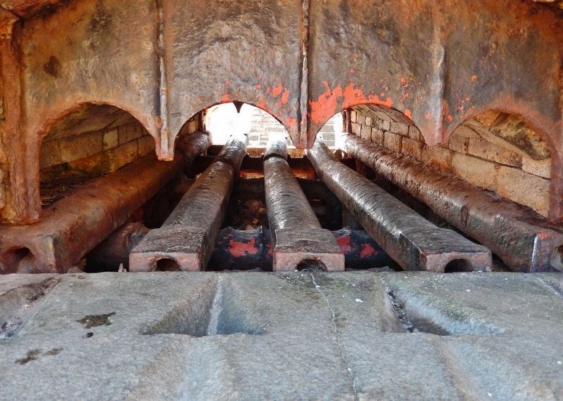 Shot Furnace interior (<i>cannonballs roll down the rails over/through the fire</i>) image. Click for full size.