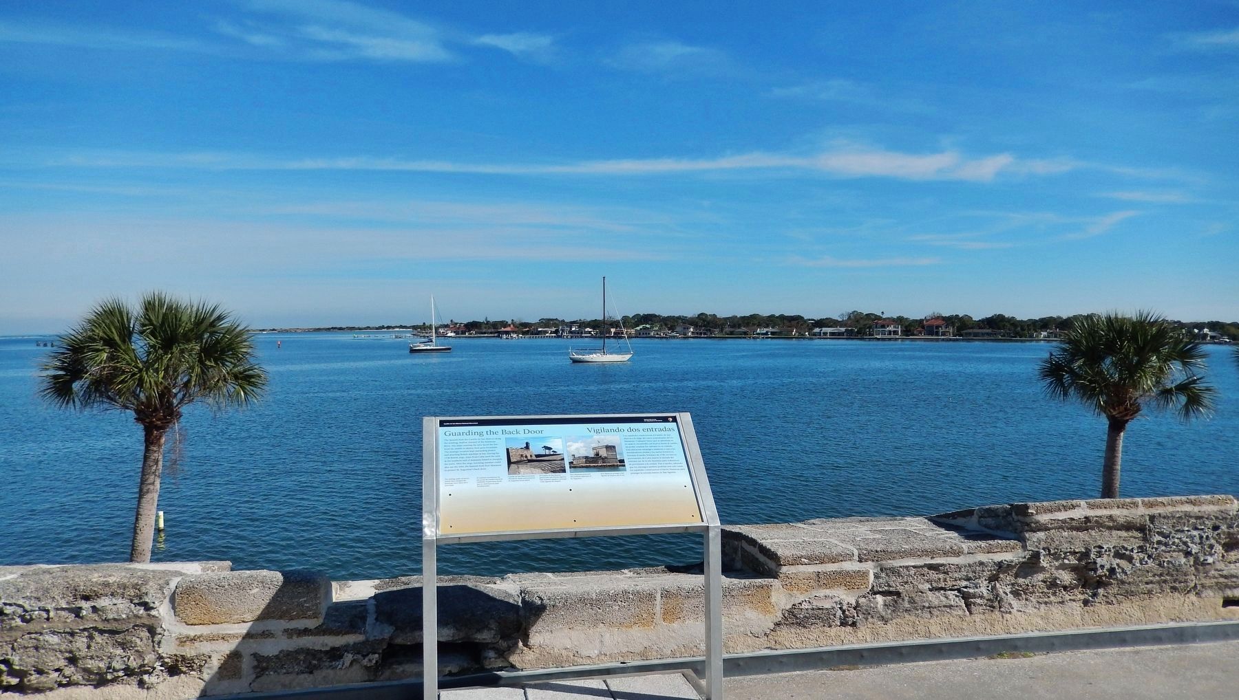 Guarding Back Door Marker (<i>wide view from San Agust�n Bastion; Matanzas Bay in background</i>) image. Click for full size.