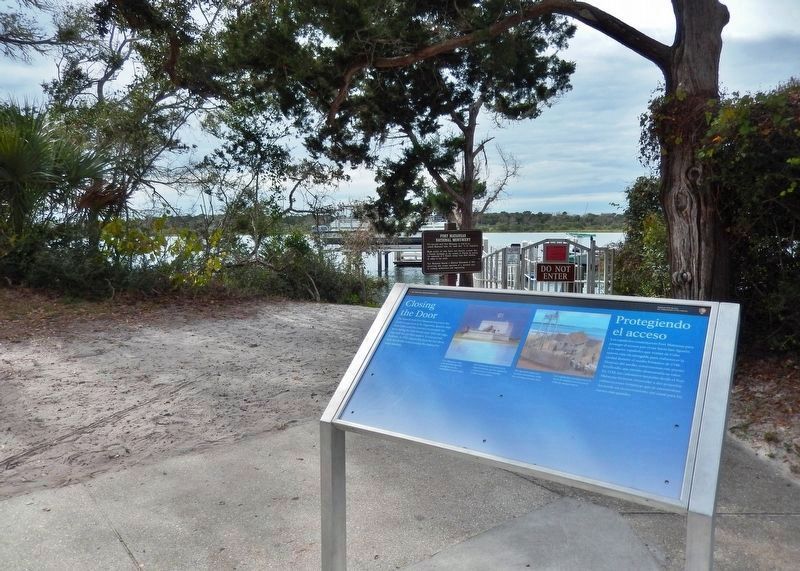 Closing the Door Marker (<i>wide view looking west across Matanzas River; related marker behind</i>) image. Click for full size.