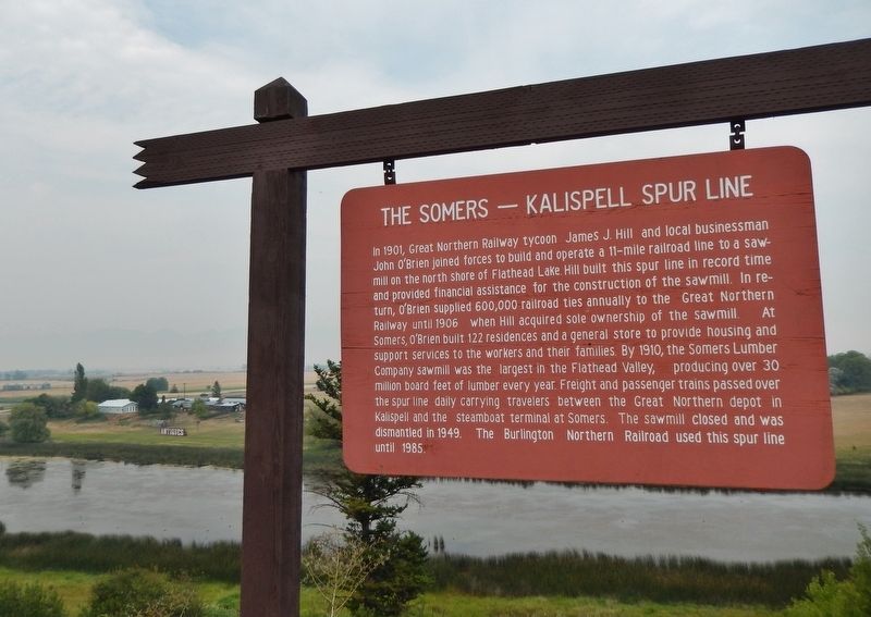 The Somers - Kalispell Spur Line Marker (<i>wide view looking east from highway pull-out</i>). Click for full size. The Somers - Kalispell Spur Line Marker (<i>wide view looking east from highway pull-out</i>) image. Click for full size.