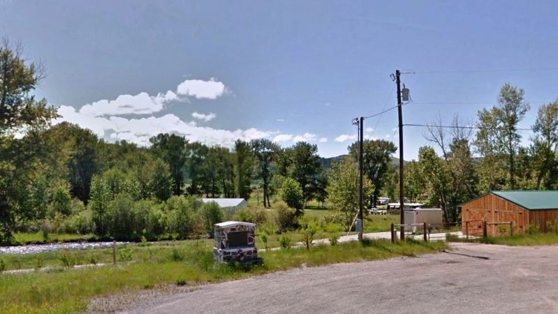Site of the First Log House in the Deer Lodge Valley Marker (<i>wide view of pull-out</i>). Click for full size. Site of the First Log House in the Deer Lodge Valley Marker (<i>wide view of pull-out</i>) image. Click for full size.