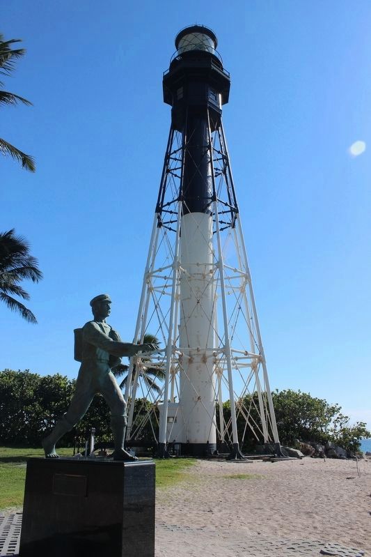 The Barefoot Mailman Marker and Lighthouse image. Click for full size.