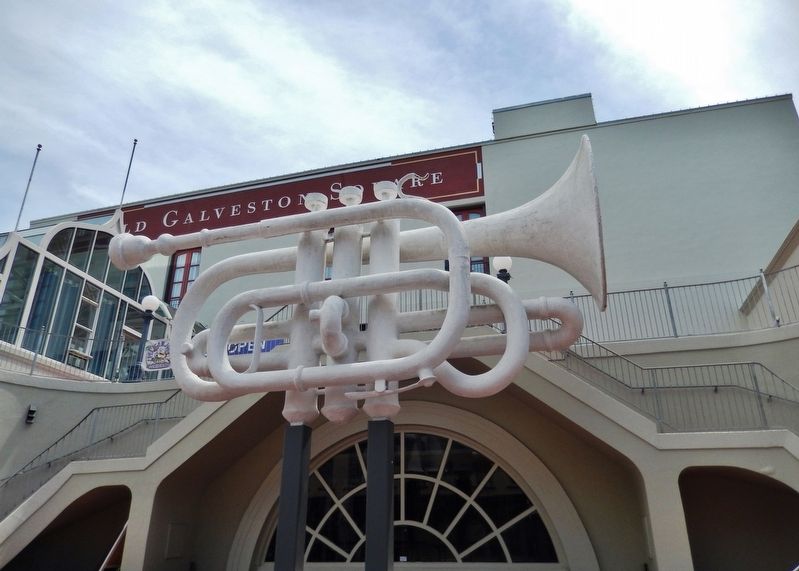 Large Trumpet Sculpture on west end of Old Galveston Square Row image. Click for full size.
