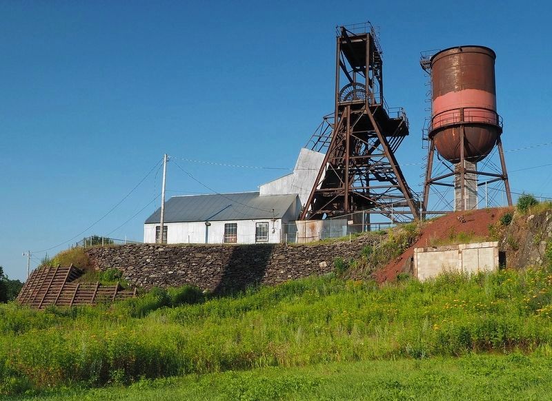 Pioneer Mine shaft house, headframe, and water tower image. Click for full size.
