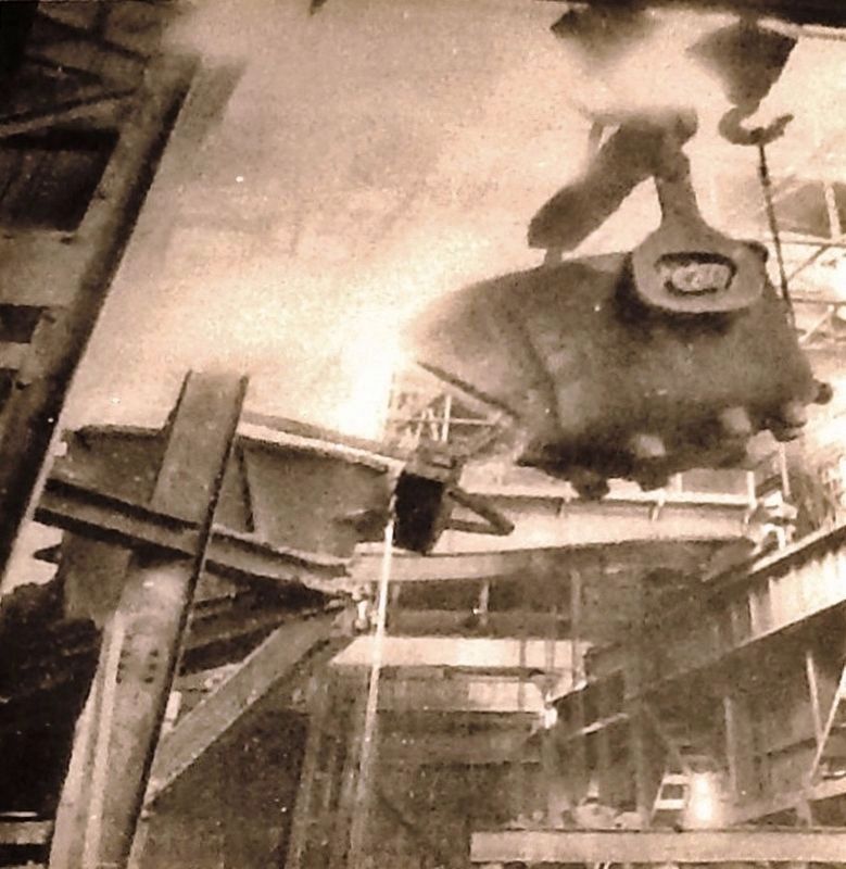 Marker photo: Overhead crane pouring a molten slag image. Click for full size.