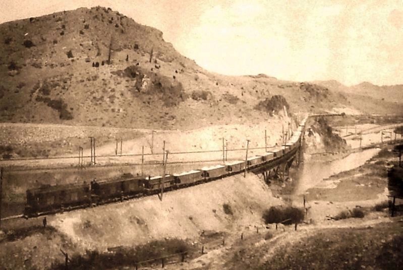 Marker photo: BA&P electrified railway carried ore from the Butte mines to the Anaconda smelters. Click for full size. Marker photo: BA&P electrified railway carried ore from the Butte mines to the Anaconda smelters image. Click for full size.