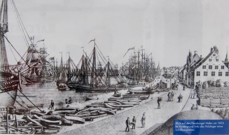 Marker inset: View of the Flensburg Harbor ca. 1833. In the left foreground is wood for a shipyard. image. Click for full size.