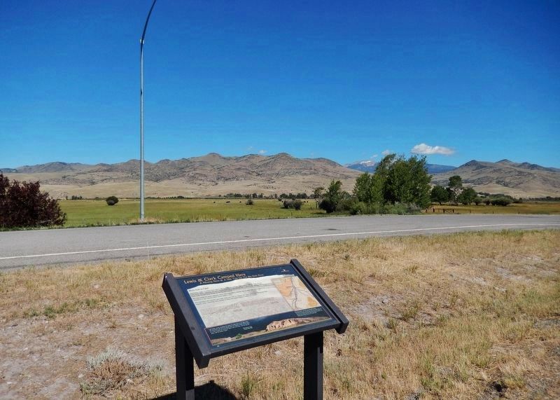 Lewis & Clark Camped Here Marker (<i>wide view; looking east across Montana Highway 41</i>). Click for full size. Lewis & Clark Camped Here Marker (<i>wide view; looking east across Montana Highway 41</i>) image. Click for full size.
