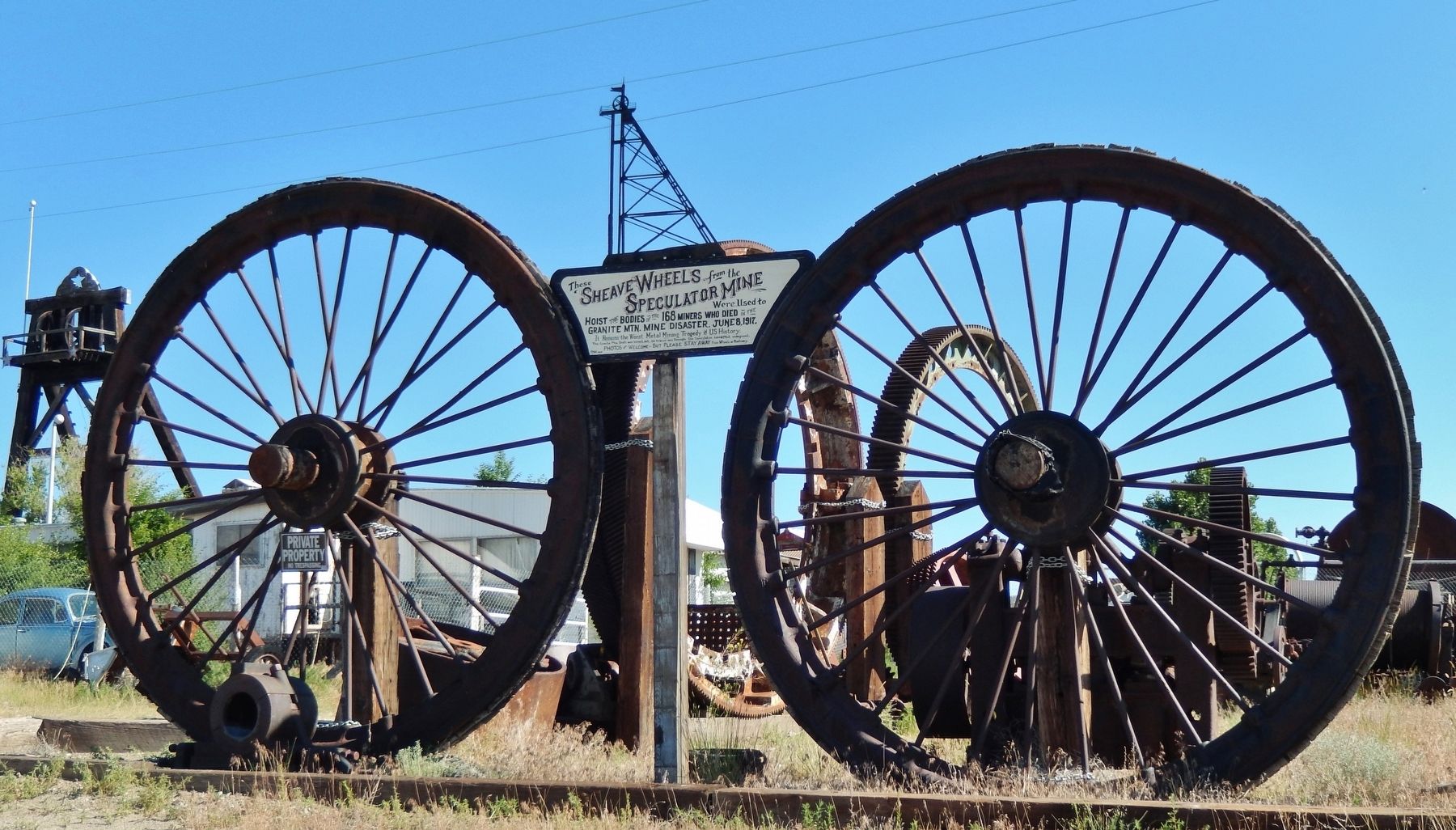 Sheave Wheels from the Speculator Mine Marker (<i>wide view</i>). Click for full size. Sheave Wheels from the Speculator Mine Marker (<i>wide view</i>) image. Click for full size.