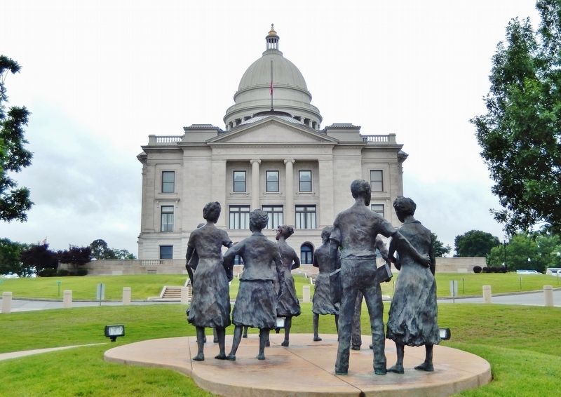 "Testament" Sculpture (<i>wide view looking south; Arkansas State Capitol in background</i>). Click for full size. "Testament" Sculpture (<i>wide view looking south; Arkansas State Capitol in background</i>) image. Click for full size.